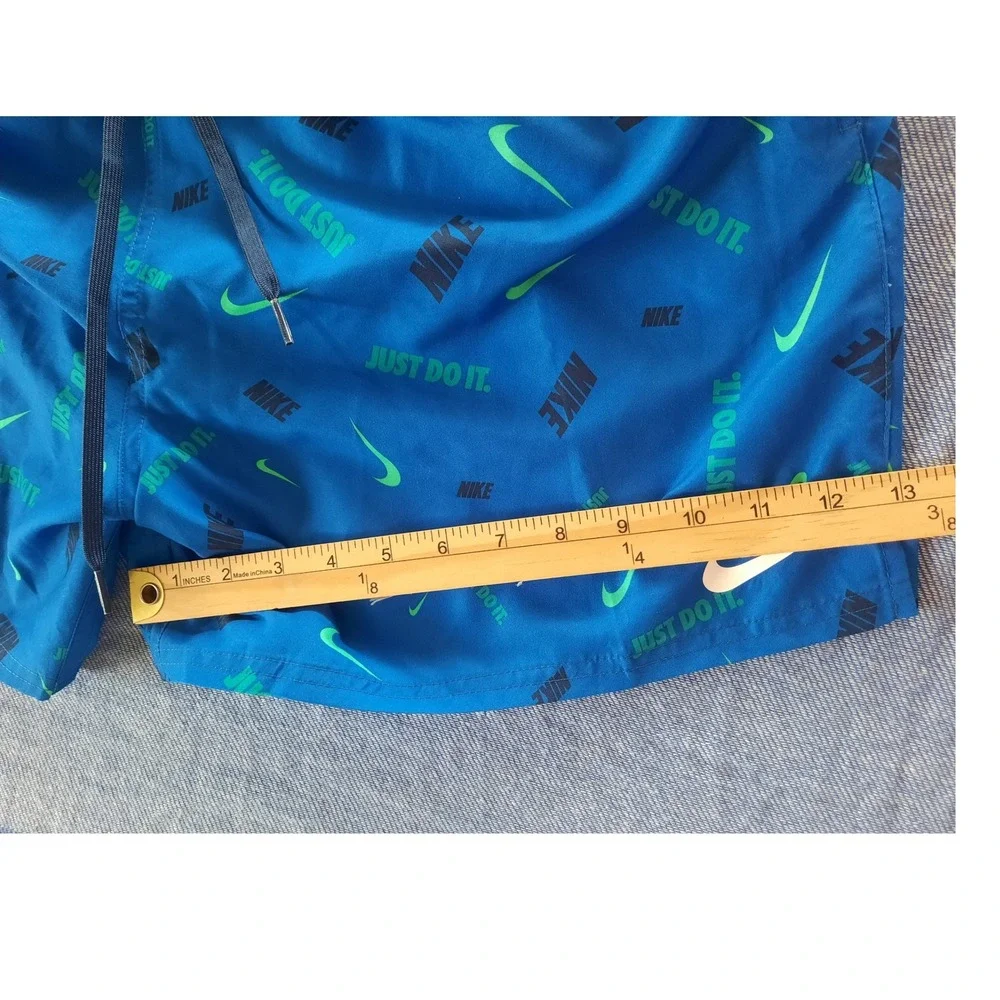 Nike Mens XL Blue Just Do It Swoosh All Over Print Swim Trunks Shorts NESSA474